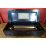 A 19th Century Swiss inlaid rosewood 10-air music box, 15cms h x 56cms w