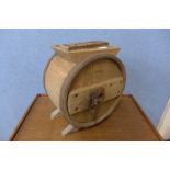 An oak butter churn