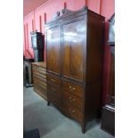 A George III inlaid mahogany linen press, 213cms h, 120cms w, 54cms d