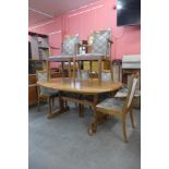 A G-Plan Fresco teak extending dining table and four chairs