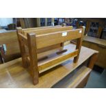 A teak magazine rack