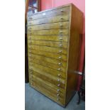 A mid 20th Century beech sixteen drawer collectors cabinet, 128cms h, 75cms w, 42cms d