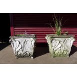 A pair of concrete garden planters, 47cms h x 50cms w