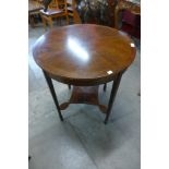 An Edward VII inlaid mahogany circular centre table