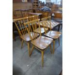 A set of four Ercol Blonde elm and beech 391 model chairs