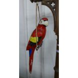 A papier mache parrot
