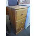 A pine chest of drawers