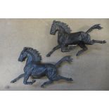 A pair of French style bronze galloping stallions, 28cms h