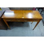 An inlaid yew wood three drawer side table