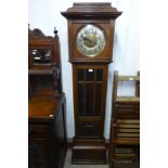 An early 20th Century oak longcase clock, 183cms h