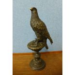 A French style bronze figure of a bird of prey, 41cms h