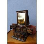 A Japanese black lacquered table top Kodansu cabinet, 23cms h x 25cms w