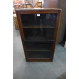 An Art Deco oak single door bookcase