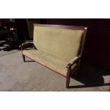 A 1930's oak and upholstered highback settle