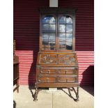 A Jacobean Revival oak barleytwist geometric moulded bureau bookcase, 216cms h, 97cms w, 49cms d