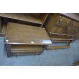 An Ercol Golden Dawn elm and beech TV stand and a plate rack