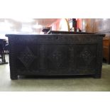 A Charles II carved oak coffer, 67cms h, 147cms w, 57cms d