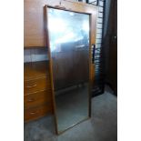 A teak framed mirror