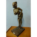 A large bronze figure of a nude lady with jug, 74cms h