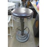 A chrome bar stool