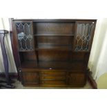 A carved oak linenfold dresser