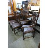 A set of five carved oak dining chairs