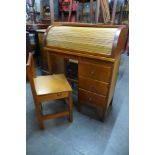 A teak child's desk and chair