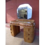 An Art Deco walnut dressing table