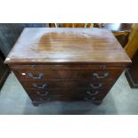 A George III style inlaid mahogany chest of drawers