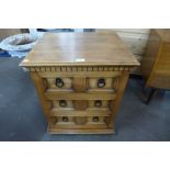 A small pine chest of drawers