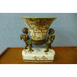 A French style gilt metal and porcelain centrepiece, 26cms h
