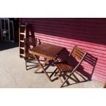 Two teak garden chairs, a table and stepladders