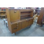 A teak highboard