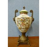 A French style gilt metal and porcelain two handled vase and cover, 43cms h