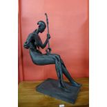 A large bronzed Surrealist figure of a seated musician, 88cms h