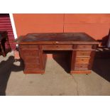 A 19th Century French oak pedestal desk, 76cms h, 146cms w, 76cms d