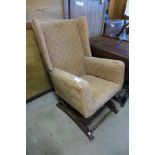 A 19th Century American upholstered mahogany rocking chair