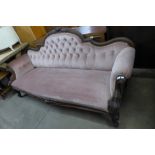 A Victorian mahogany and upholstered settee