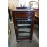 An Edward VII mahogany music cabinet