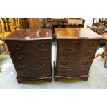 A pair of small mahogany serpentine chests of drawers, 72cms h, 53cms w, 41cms d
