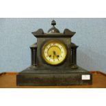 A 19th Century French Belge noir mantel clock, 34cms h