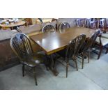 An oak refectory table and five beech wheelback chairs