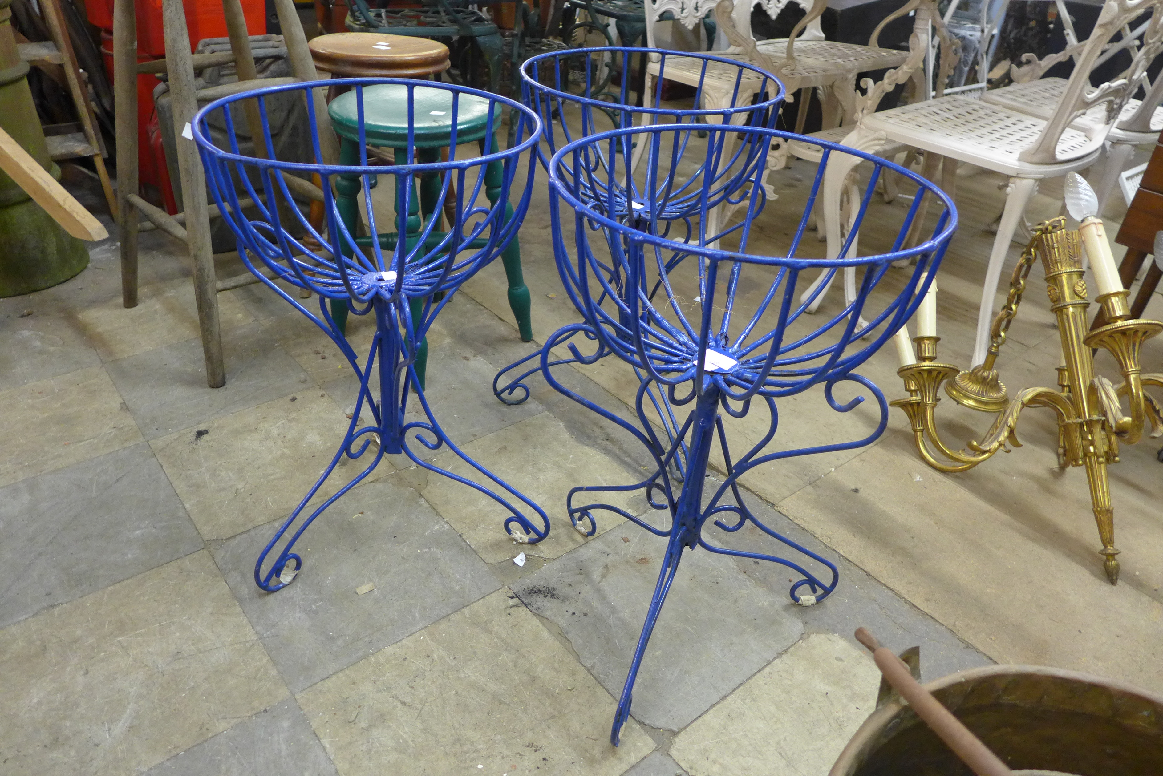 Three metal plant stands