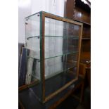 A glass table top display cabinet, 77cms h, 61cms w, 31cms d