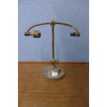 An early 20th Century brass desk lamp