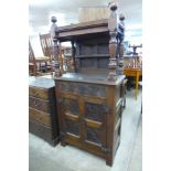 A 17th Century and later carved oak credence cupboard