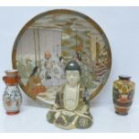 A Satsuma Buddha, a vase, 7024, a Kutani vase decorated with figures and a Satsuma charger (