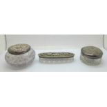 Three glass jars with silver lids, lids a/f, weight of silver 62g