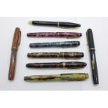 A collection of eight pens including 2x Unique, Wyvern and Mentmore, all eight with 14ct gold nibs