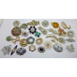 Thirty costume brooches